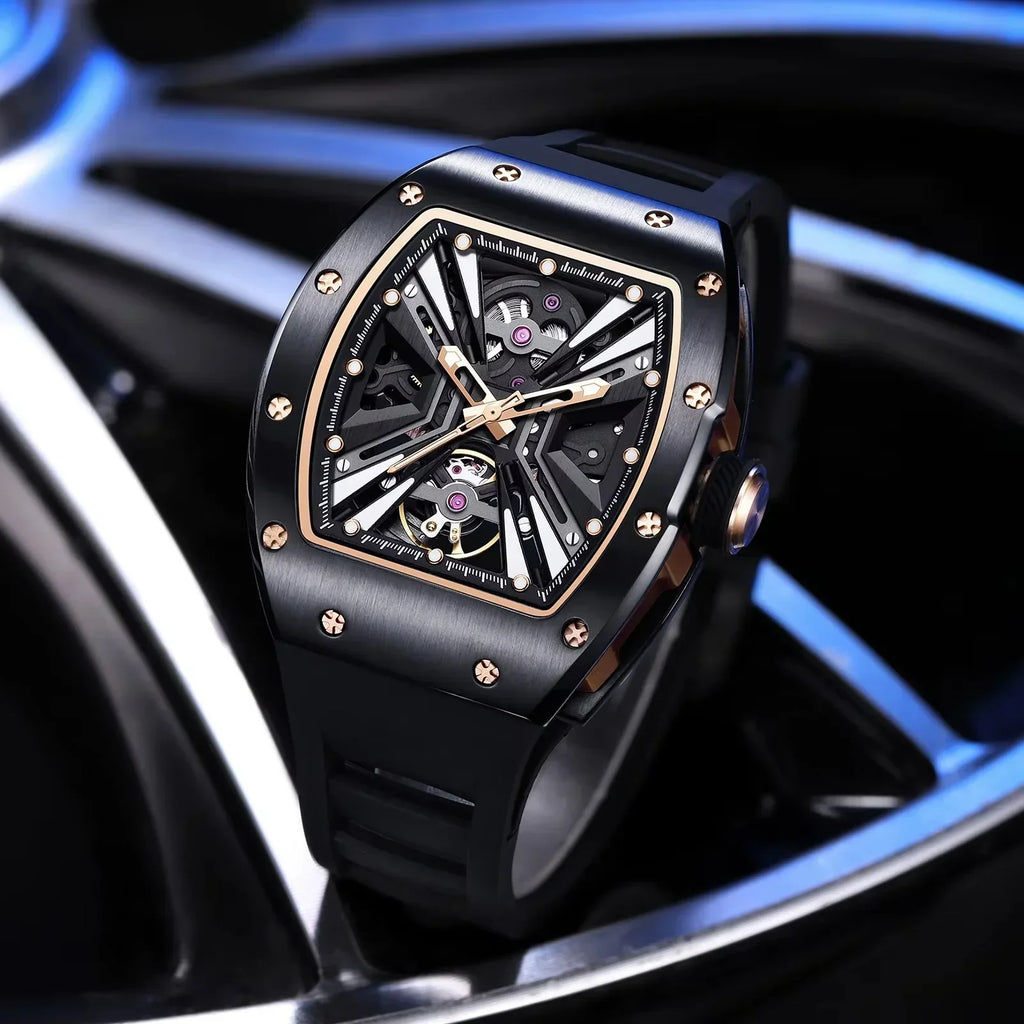 Luxury skeleton dial racing-inspired automatic watch with tonneau case and black rubber strap