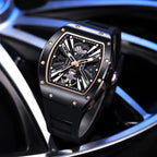Luxury skeleton dial racing-inspired automatic watch with tonneau case and black rubber strap