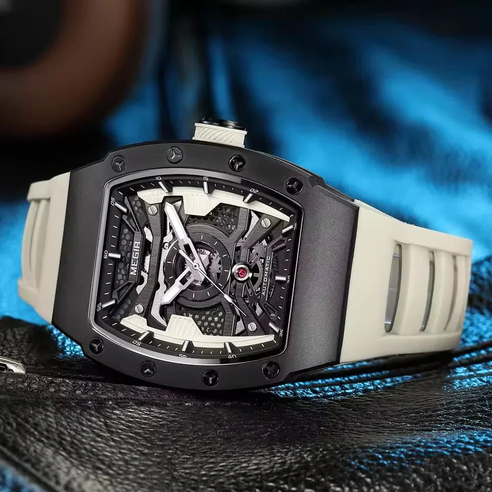 Luxury racing-inspired skeleton watch with bold tonneau case and white rubber strap