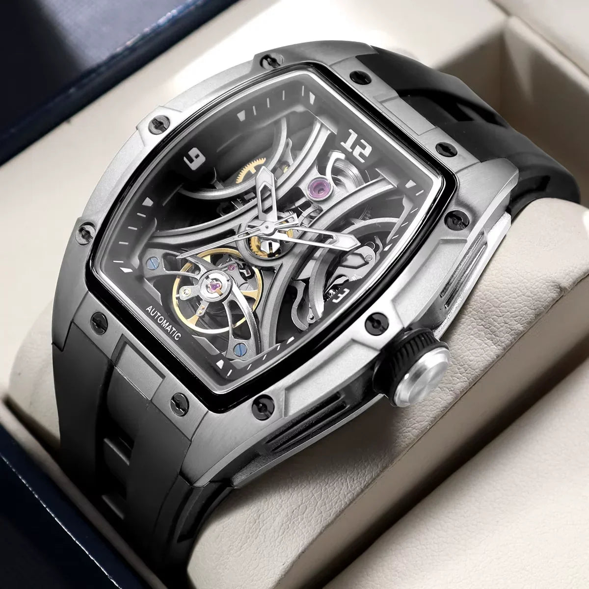 Skeleton dial automatic watch with exposed gears, tonneau case, and sporty black strap