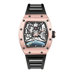 Luxury rose gold tonneau-shaped watch with skeleton dial, moonphase and planet accents, black strap