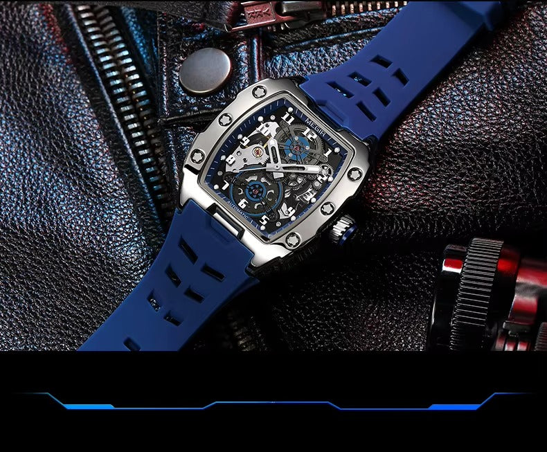 Motorsport-inspired luxury watch with blue strap and openwork dial on a black leather jacket