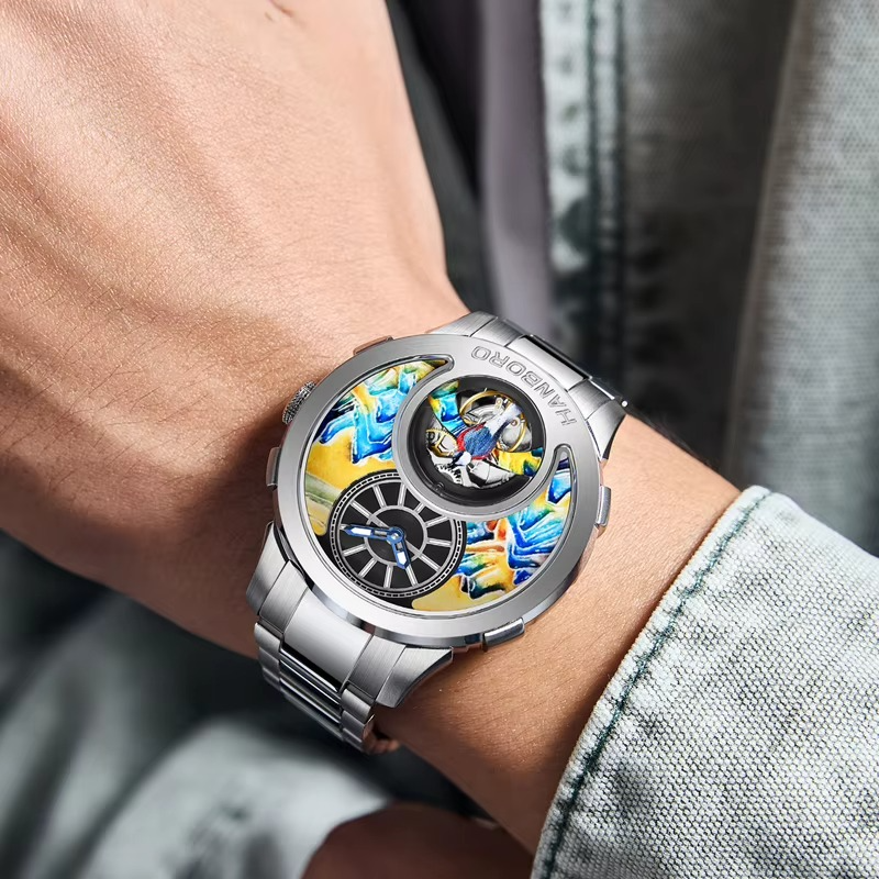 Luxury sport watch with colorful artistic dial and open-heart movement on a wrist