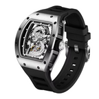 Luxury skeleton watch with dragon dial, tonneau case, and black rubber strap, motorsport-inspired design