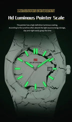 Racing-inspired luxury watch with marble-patterned case and luminous green hands and markers.