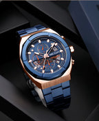 Luxury blue and gold chronograph watch with bold dial, inspired by motorsport performance