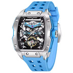 Motorsport-inspired skeleton dial watch with bold blue strap and stainless steel case