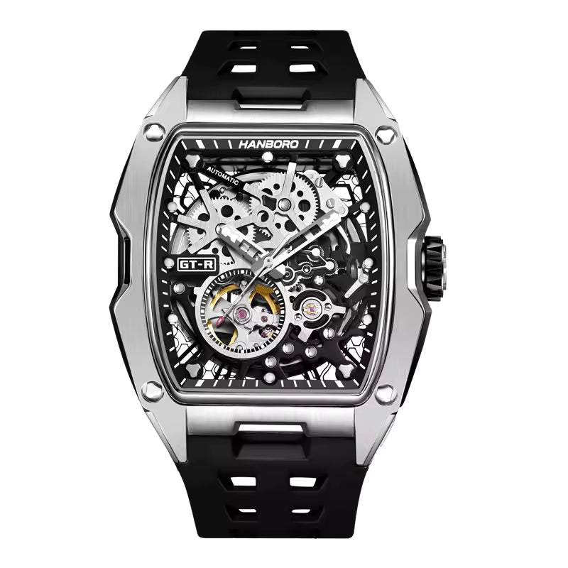 Motorsport-inspired skeleton dial watch with visible gears, tonneau case, black rubber strap