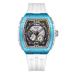Motorsport-inspired luxury watch with blue tonneau case, skeleton dial, white rubber strap