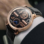 Luxury motorsport-inspired skeleton watch with rose gold case, black strap, and exposed gears on wrist