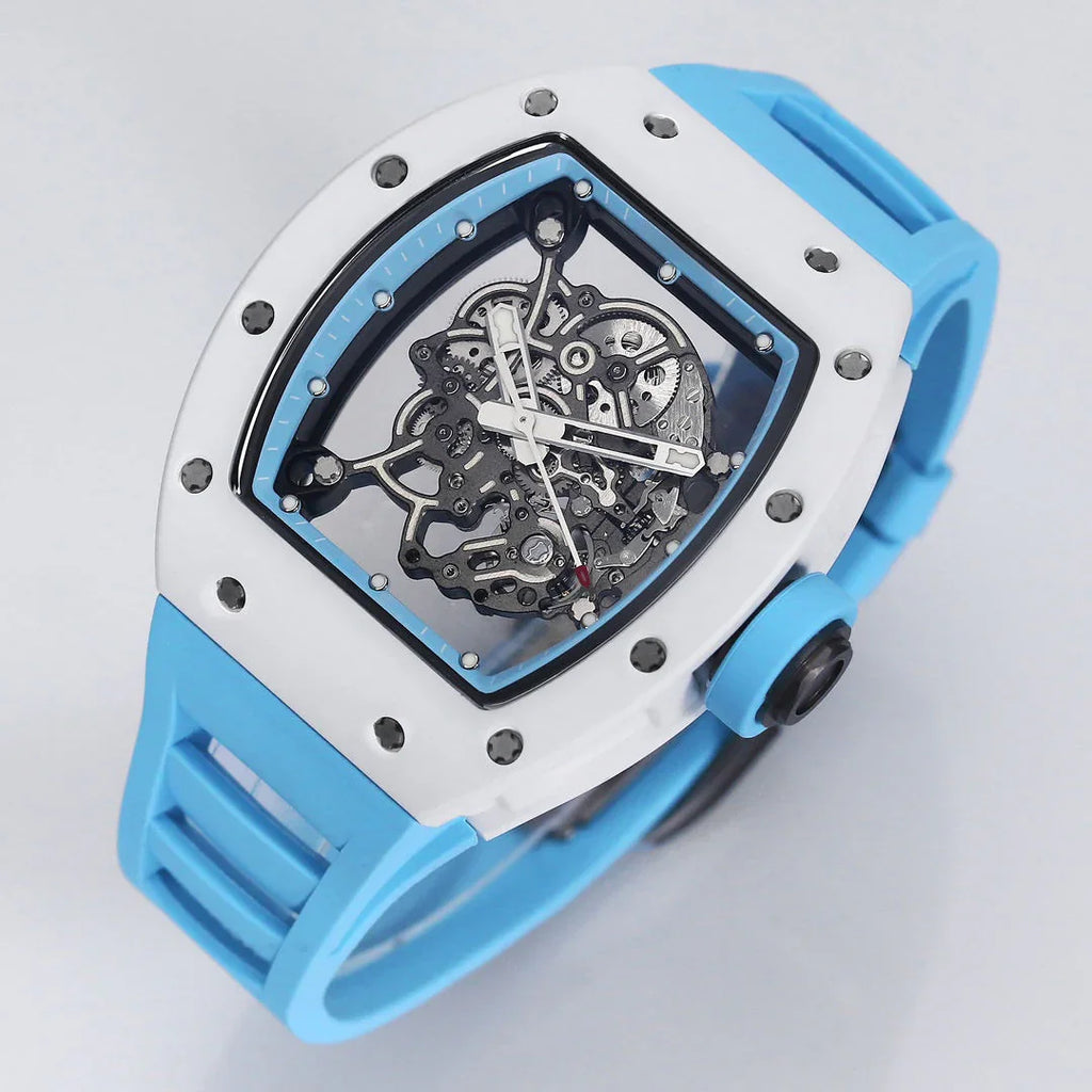 Luxury skeleton watch with white case, blue strap, and exposed mechanical movement, motorsport inspired