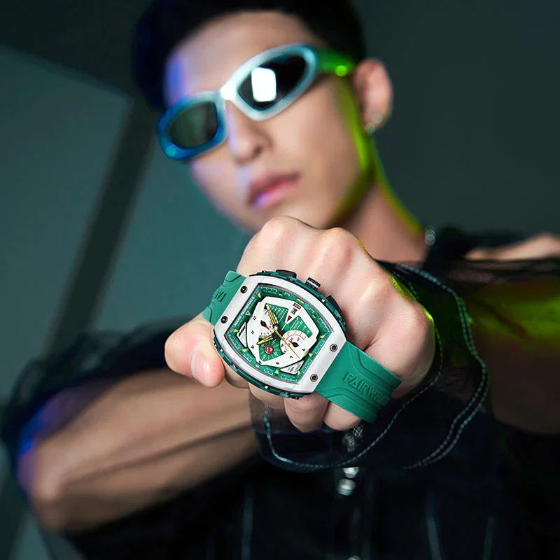 Man wearing sunglasses displaying a green motorsport-inspired luxury sport watch with bold design.