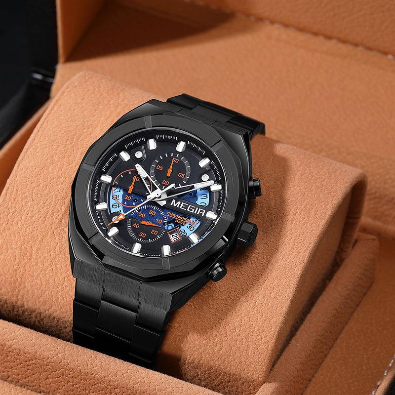Black motorsport-inspired luxury chronograph watch with bold dial in tan display box