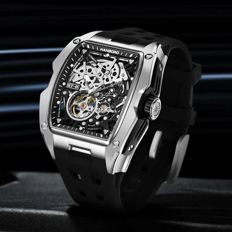Motorsport-inspired luxury skeleton watch with tonneau case, exposed gears, black strap