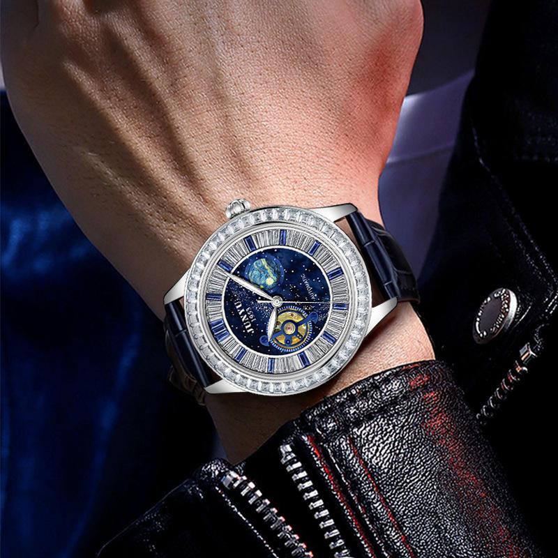 Luxury sport-inspired watch with starry blue dial, diamond bezel, and bold design on wrist