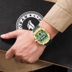 Gold case green dial sport-luxury watch with chronograph on wrist, racing-inspired design