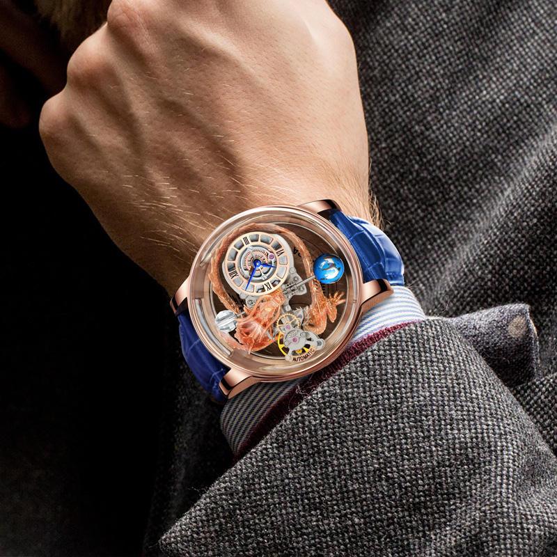 Luxury motorsport-inspired skeleton watch with blue strap and rose gold case on wrist