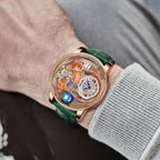 Luxury skeleton sport watch with rose gold case, intricate dragon design, and green strap on wrist