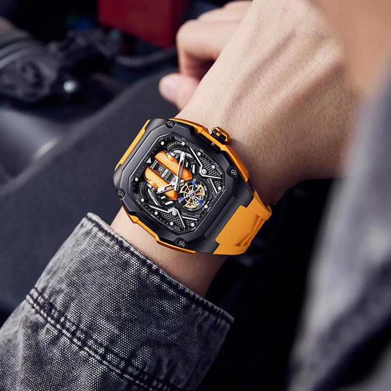 Motorsport-inspired luxury watch with orange strap and skeleton dial on wrist