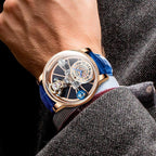 Luxury motorsport-inspired skeleton watch with blue strap, rose gold case, openwork dial