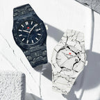 Black marble and white marble-inspired luxury sport watches with bold dials and date display