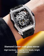 Luxury racing-inspired skeleton watch with tonneau case, diamond details, and black rubber strap