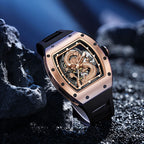 Luxury tonneau-shaped watch with gold dragon design, openwork dial, and racing-inspired style