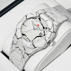 Luxury sport-inspired watch with white marble-pattern case, bold dial, and date display