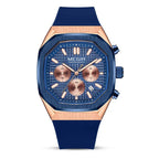 Blue and rose gold sport-luxury chronograph watch with bold octagonal face and rubber strap
