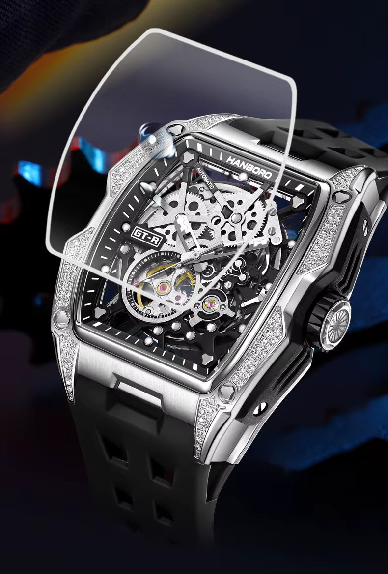 Luxury motorsport-inspired skeleton watch with tonneau case, diamond accents, black rubber strap