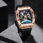 Luxury motorsport-inspired skeleton watch with rose gold case, black strap, and intricate dial