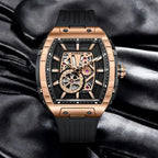 Luxury skeleton dial watch with rose gold case, black strap, and visible automatic movement