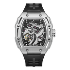 Luxury skeleton automatic watch with tonneau case, exposed gears, and black rubber strap