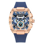 Luxury motorsport-inspired chronograph watch with rose gold case, textured blue dial, and blue strap