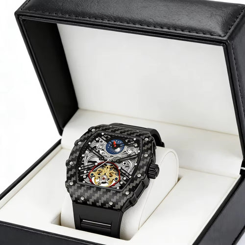 Luxury carbon fiber skeleton chronograph watch with intricate mechanical movement in a gift box.
